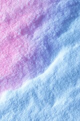 Snowdrift with pink and blue lighting, close-up