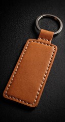 Leather keychain, rectangular with silver ring, textured black