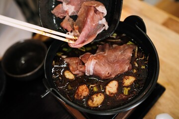 Thai-Japanese Fusion: Boat Noodle Nabe Hot Pot - Tabletop Cooking Scene