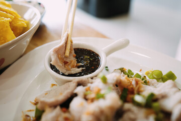 Restaurant Menu Display: Appetizing Platter of Thai Boiled Meat Dip
