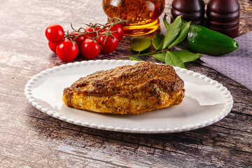 Baked chicken breast with spices and herbs