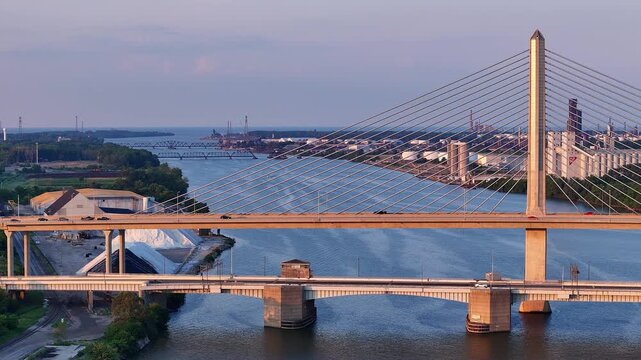 Craig Memorial Bridge over Maumee River in Toledo, Ohio at sunset in aerial view