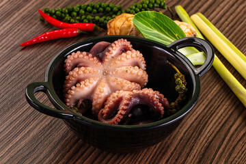 Gourmet Boiled octopus in the bowl © Andrei Starostin
