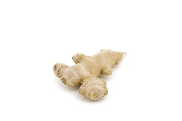 Raw ginger displayed on clear white background.
