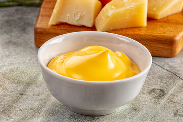 Yellow cheddar cheese creamy sauce