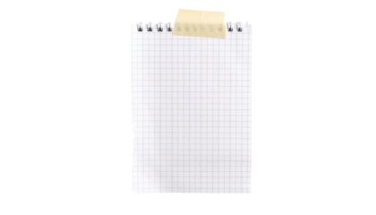 A grid-lined notepad with a torn edge and taped section