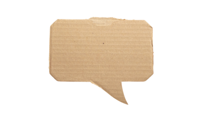 A cardboard cutout shaped as a speech bubble, isolated on a black background