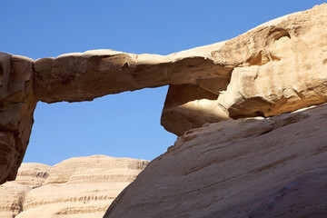 Natural arch or rock arch at Wadi Rum, Jordan