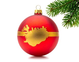 A glossy red Christmas ornament with a gold-toned Iceland-shaped design and a pine bough against a white background