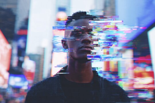 Glitch-art representation of a person reflecting fears of technology