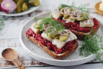 Scandinavian sandwiches with herring and beetroot	