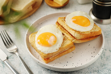 A croque madame sandwich, traditional dish of French cuisine	