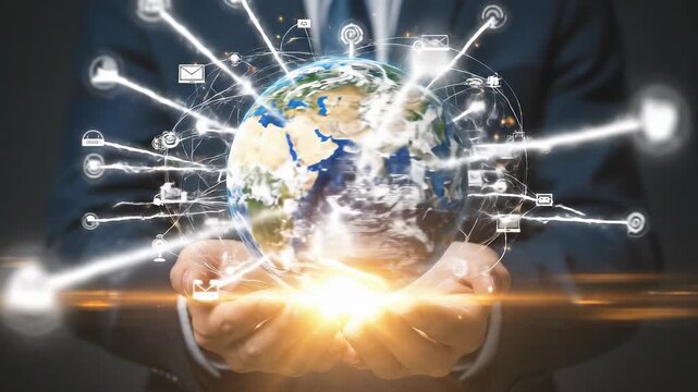 Businessman holding glowing planet Earth connected by digital network lines and communication icons symbolizing global business internet and future technology - Powered by Adobe