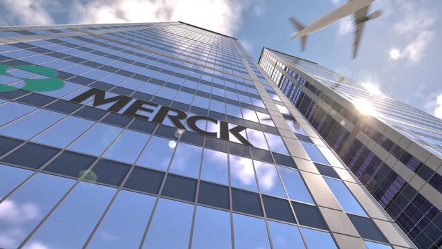 Merck branding displayed on a sunlit tower face, shown as an illustrative editorial 3d rendering