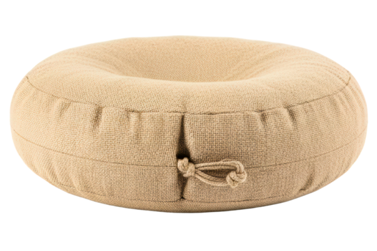 Round floor pouf cushion made of natural beige jute fabric isolated on a transparent background