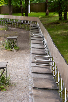 Geometric metal railing architecture creating dynamic corridor design with pathway, urban elements and structure in HafenCity Hamburg Germany