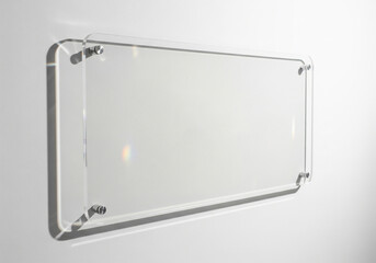 Minimalist tall glass signage panel with faint reflection - A transparent, rectangular sign mounted on a wall. Perfect for business presentations and announcements