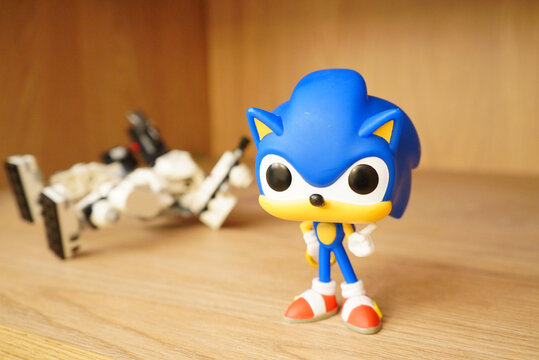 Sonic the Hedgehog Funko Pop figure with a Lego model in the background