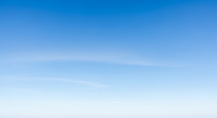 Clear blue sky with subtle gradient and barely visible wispy clouds, ideal for background or copy space.