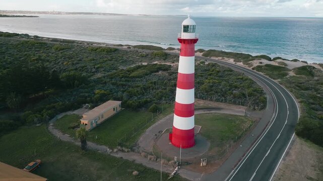 Cinematic aerial footage panning around the Point Moore Lighthouse in Geraldton, Western Australia. The lighthouse serves ships in the Indian Ocean in the vicinity of Geraldton.