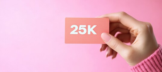 Hand Holding a Pink Card Showing Achievement, Appreciation Symbol, and Celebrating a Goal, Progress