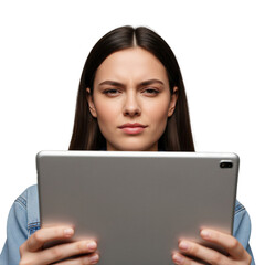 Skeptical young woman with a serious frowning expression holding a silver digital tablet and looking intently at the screen isolated on transparent background, png