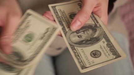 Close-up business woman hands counting money cash. Rich people, successful businesswoman, winner wage dollars salary, prize win. Business assets, freelancing, or illegal activities