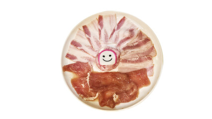 Raw pork slices arranged with smiling fish cake