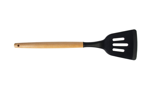 Hand holding kitchen utensils on transparent background