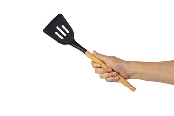 Hand holding kitchen utensils on transparent background