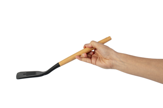 Hand holding kitchen utensils on transparent background