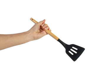 Hand holding kitchen utensils on transparent background