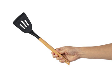Hand holding kitchen utensils on transparent background