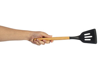 Hand holding kitchen utensils on transparent background