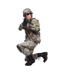 Fototapeta premium A soldier in camouflage clothing kneels and aims a rifle
