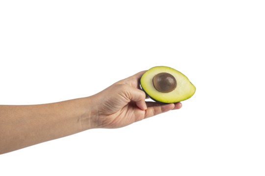 whole and half avocado and hand isolated on transparent background close-up. - Powered by Adobe