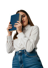 Young woman student in white shirt and jeans holding a blue book, covering half of her face, looking at camera, isolated on transparent background, png.