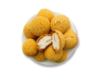 Golden choux buns with a crisp craquelin top, filled with smooth vanilla cream