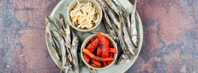 Beer and dried fish.
