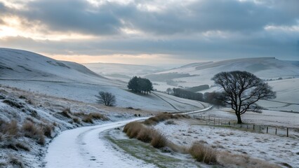 Naklejka premium A serene winter landscape photo featuring snowy hills and a winding abstract pathway. 