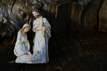 Birth of Jesus Christ - Christmas nativity scene of the Holly family in the crib in Bethlehem,...
