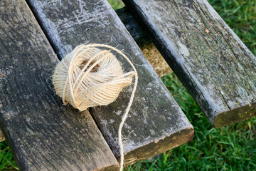 Outdoor. ball of string on wood