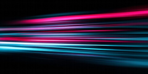 Vibrant streams of neon light streak horizontally across a dark background creating an abstract sense of speed