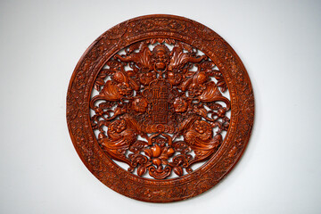 Intricate wooden wall decor showcasing traditional artistry