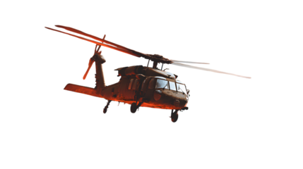 Military helicopter in flight against a dark night sky