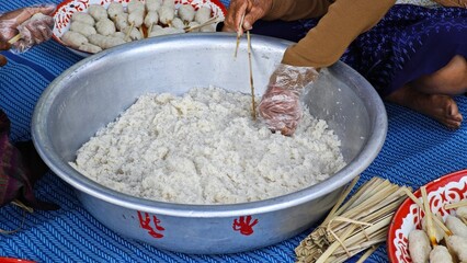 ISAN Cuisine. Grilled Sticky Rice Dipped with Egg.