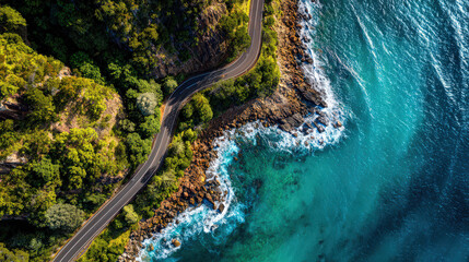 bird's eye view coastal road with ocean and cliffs