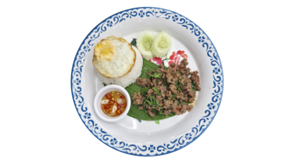 Classic Thai dish “Pad Kra Pao” featuring stir-fried minced beef with holy basil, served with jasmine rice, fried egg, cucumber, and chili fish sauce