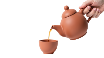 Hand pours tea from clay teapot into matching cup, showcasing warm and inviting moment of tea preparation