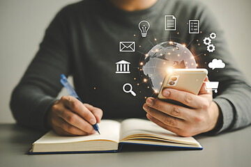 Global business strategy planning with mobile technology and notebook for success ideas concept